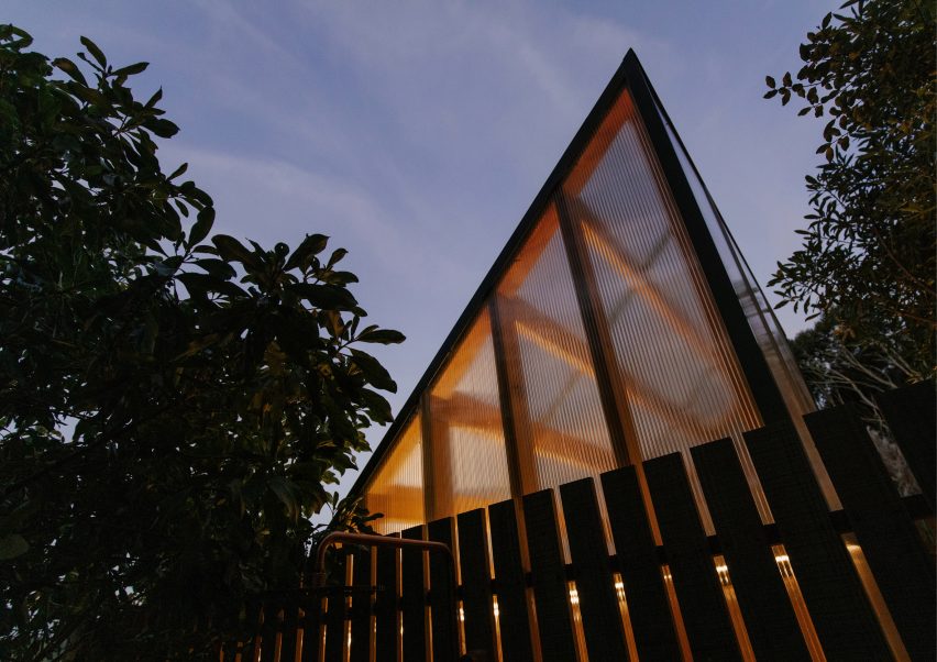 Top of a mono-pitched polycarbonate shed covered in timber battens