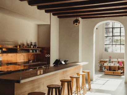 Wooden bar in Nikolaj Kunsthal by MEE Studio