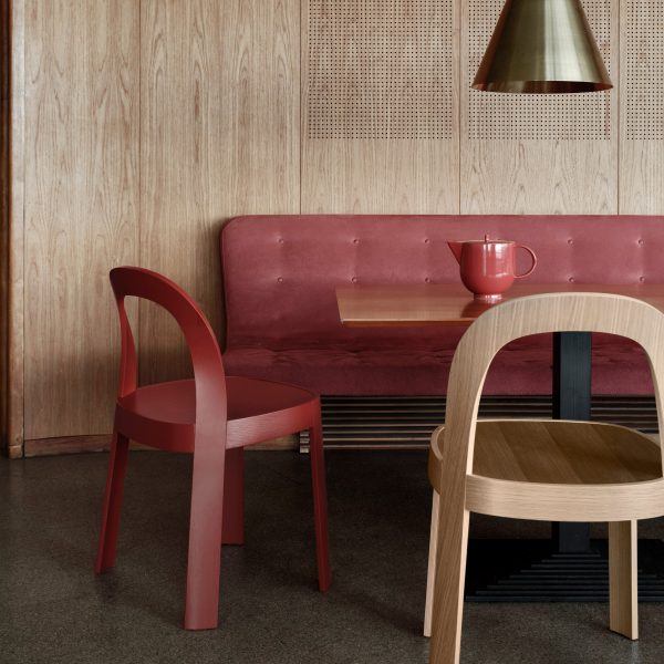 Burgundy red and beige chair arranged around table