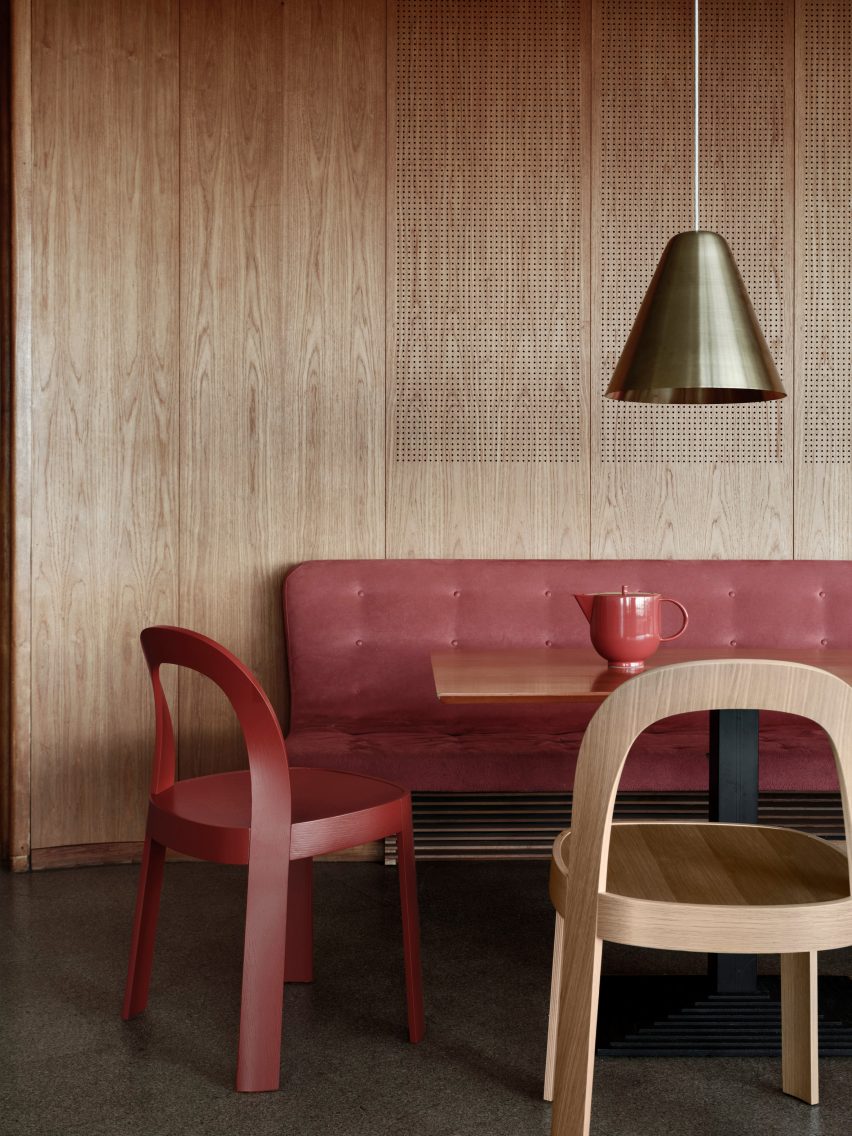 Burgundy red and beige chair arranged around table