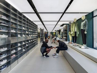 Stainless steel shoe cabinets are located on the upper floor