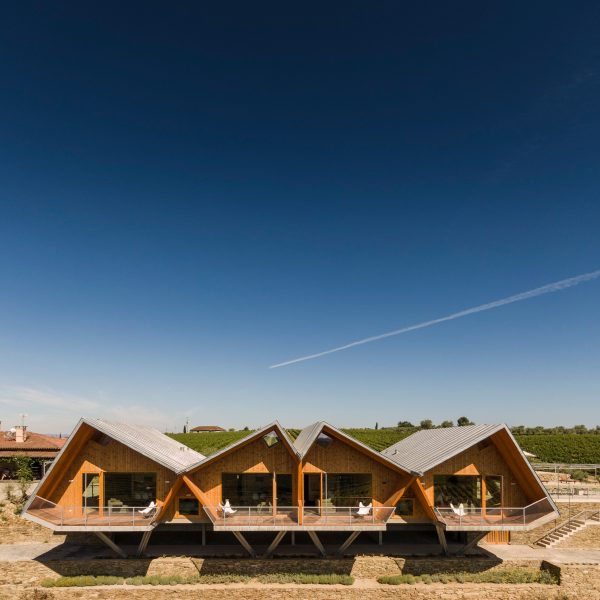 Angular roofline and balconies at Quinta da Faísca apartments by Carlos Castanheira