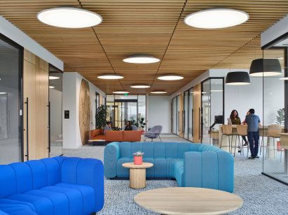 Internal lounge area with colourful sofas