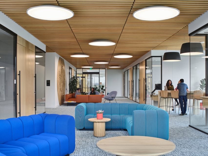 Internal lounge area with colourful sofas