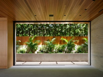 Pocket door open to verdant view