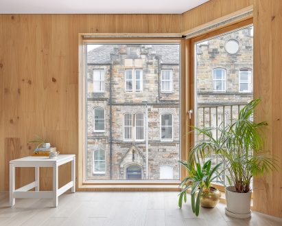 Apartment with exposed timber walls