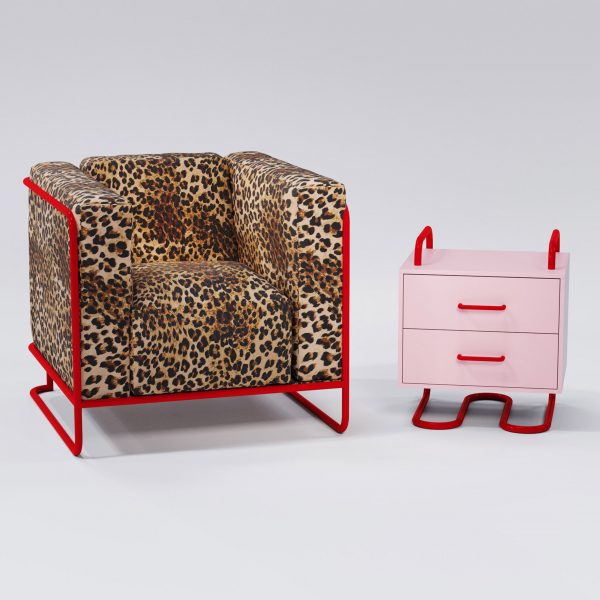 Leopard print armchair with pink side table