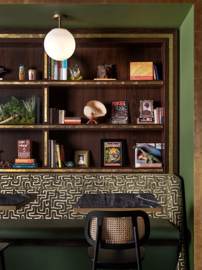 Shelving above banquette seating