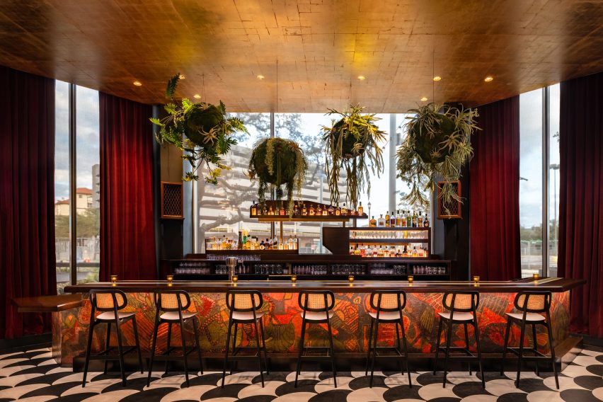 Bar with painted mural by Carissa Marx