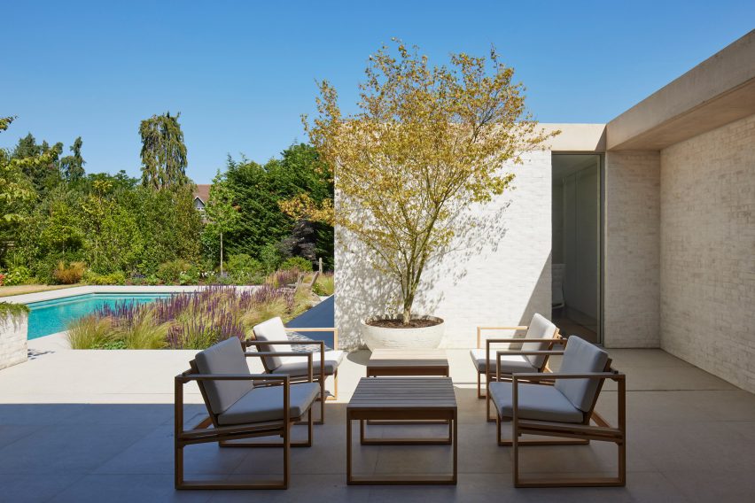 Swimming pool terrace at The Pines house extension by Ström Architects