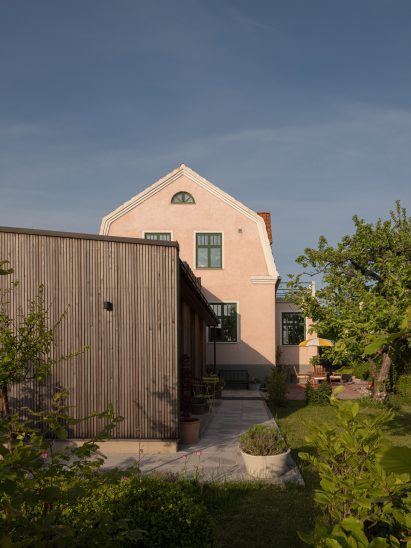 Larch-clad extension of 1920s villa in Sweden