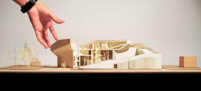 Elaborate architectural model in front of white backdrop