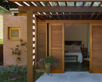 Slatted French doors that open out onto a veranda
