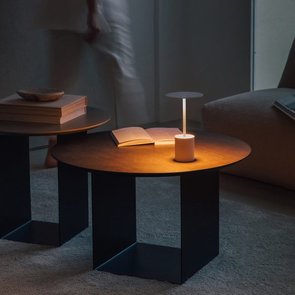 Photo of tables and a lamp