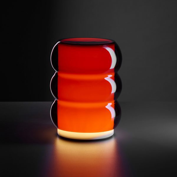Photo of red table lamp