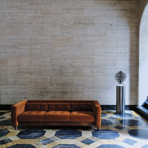 Photo of a brown velvet sofa