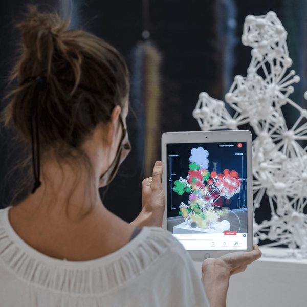 A student with her design project