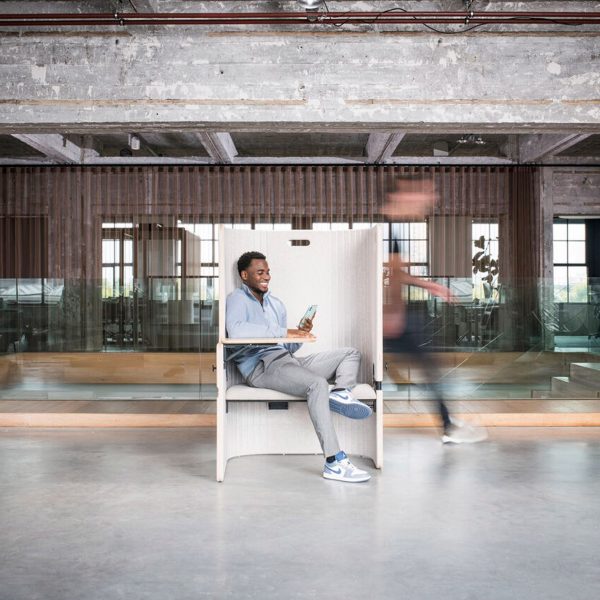 Photo of a person sat in a booth