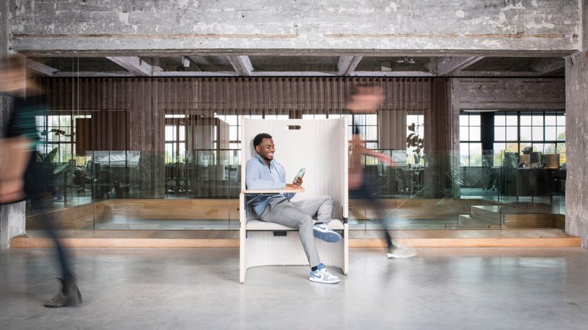 Photo of a person sat in a booth