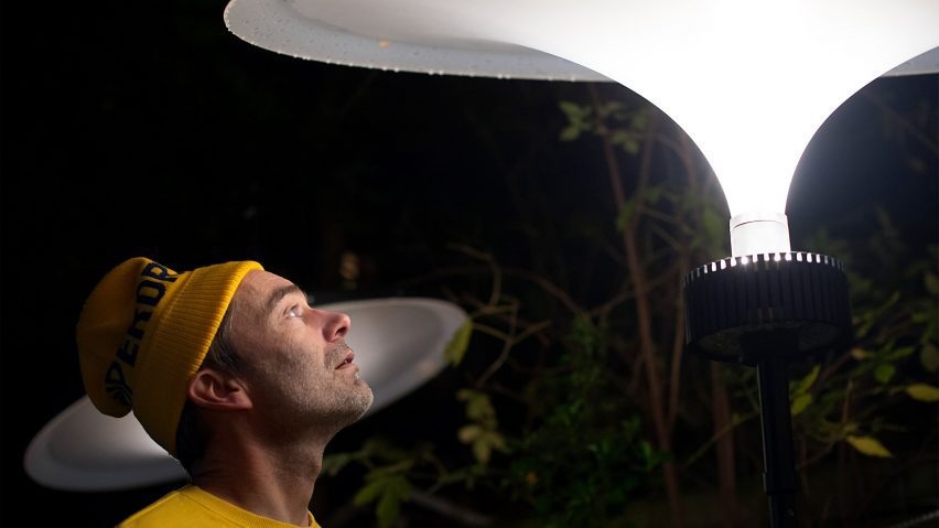 Photo of a person looking at a light