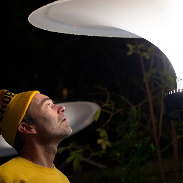 Photo of a person looking at a light