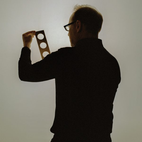 Photo of a person holding equipment