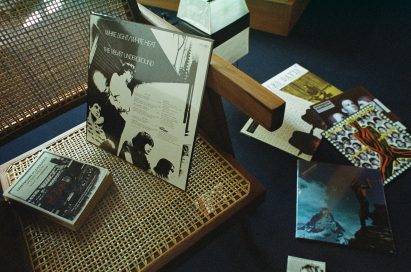 A selection of films on a rattan chair