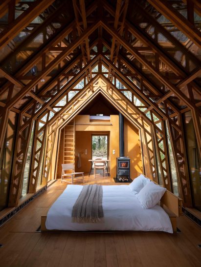 Interior of small wooden house by Caspar Schols