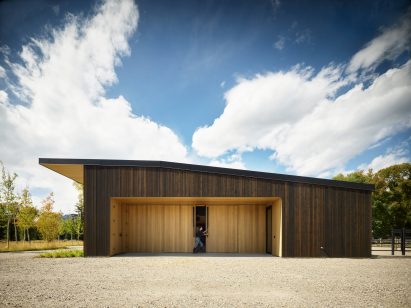 Low-slung wood-lined barn on Wyoming ranch 