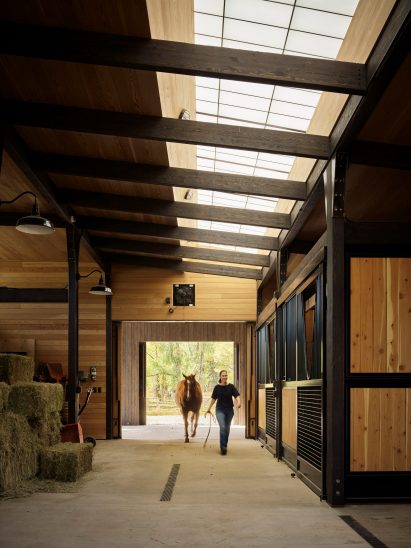 Illuminated barn with wood-lined interior