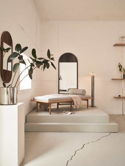 Daybed presented on a raised plinth