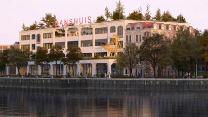 Riverside view of dance centre by MAD