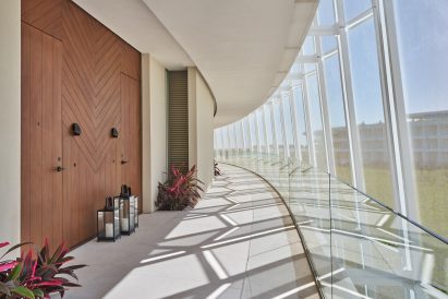 Hallway with glass and fabric shades