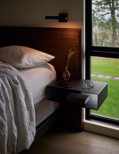 Dark wood within bedroom of Oregon house by Ueda Design Studio