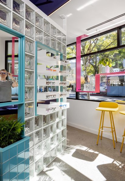 Glasses displayed on shelves with the glass block partitions