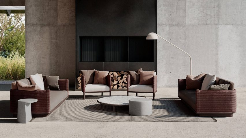 Brown chairs in front of large fireplace