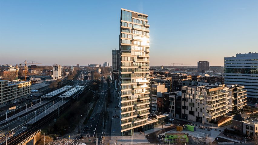 Exterior of the Haut mass-timber high-rise building in Amsterdam by the waterfront