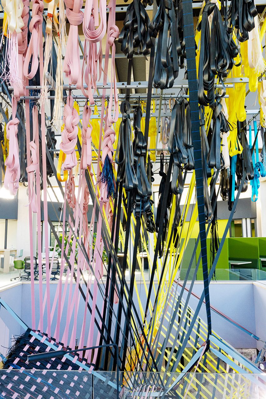 Multi-coloured Loom Room woven installation