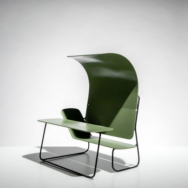 Photograph showing chair with in built canopy and desk