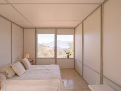 Bedroom interiors clad with laminated wood boards 