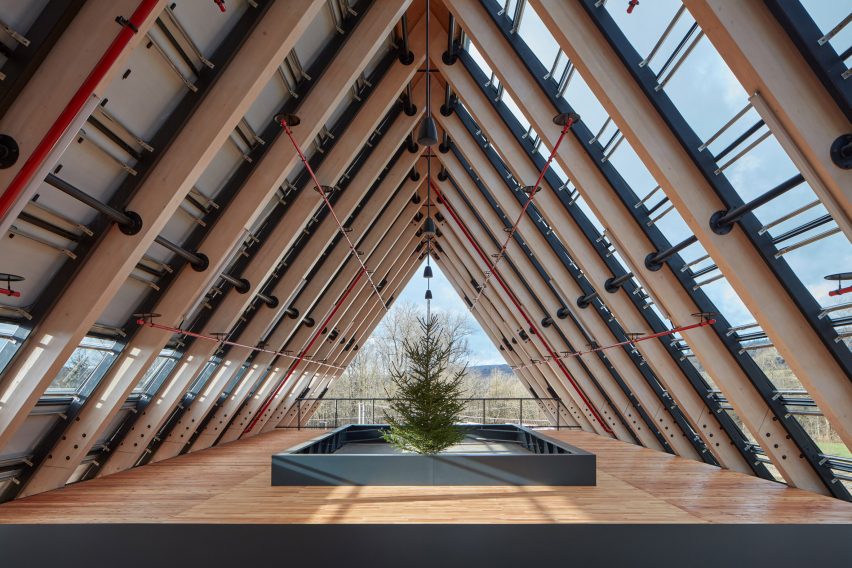 Room underneath gabled roof of Kloboucká lesní HQ