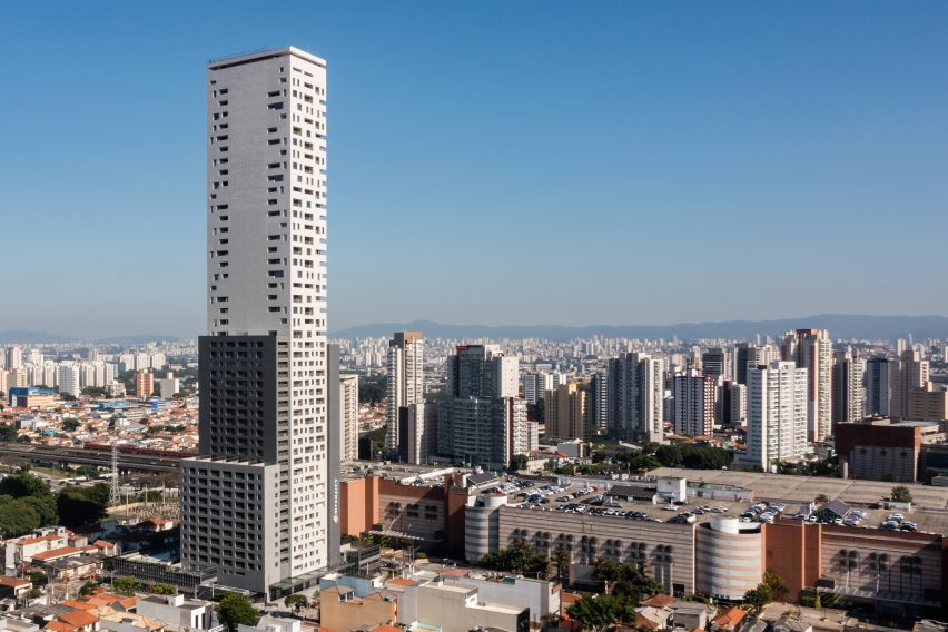 skyscraper with city in the background