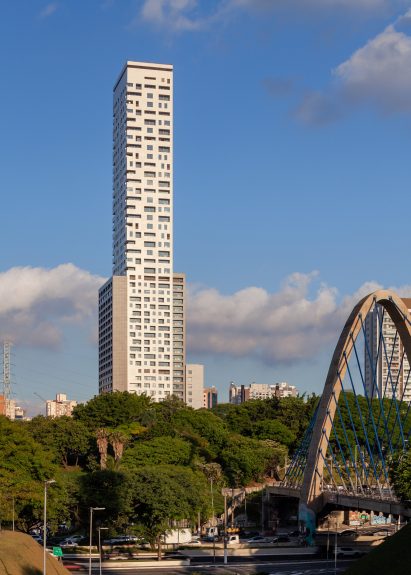 Skyscraper with trees in the foreground