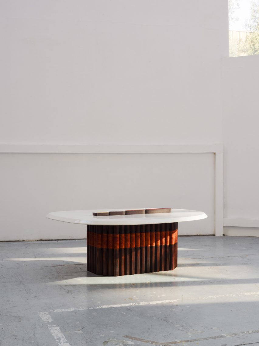Lava coffee table by Matand with cedar wood base and white tabletop