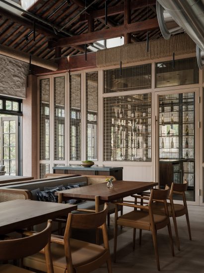 Wine bar with wooden furniture in Gaga's Coast restaurant