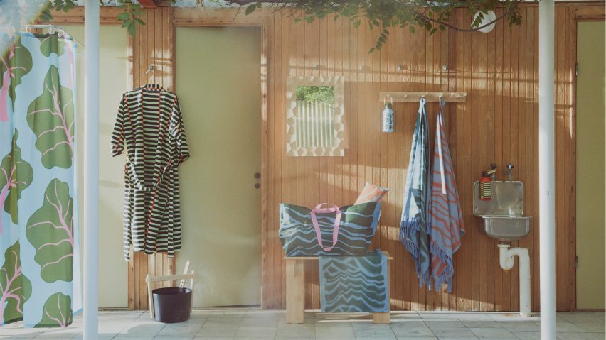 Bastua bath collection by Marimekko and IKEA in a wood-clad room