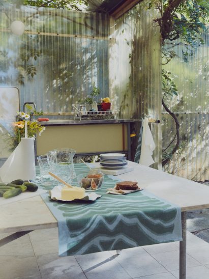 Bastua printed tablecloth on a table with dishes
