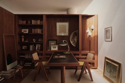 Wood-panneled study by Child Studio