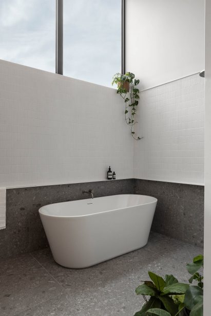 Sunlit bathroom within home by Ménard Dworkind