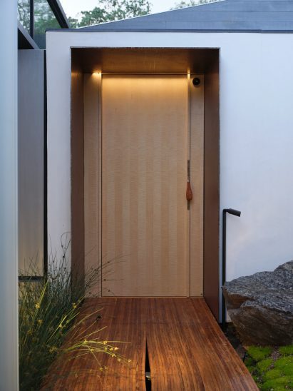 Wabi-sabi style cedar walkway made with offcuts from the construction project by Neal Schwartz
